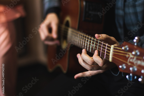 person playing guitar