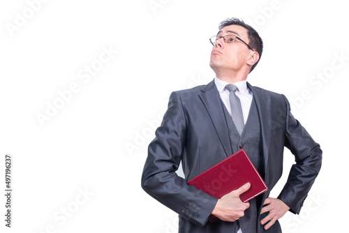 Arrogant man with book in light studio