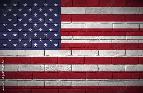 United States. Flag painted on a brick wall. Stany Zjednoczone. Flaga namalowana na ceglanym murze.