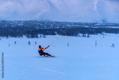 kiting in the winter mountains in russia