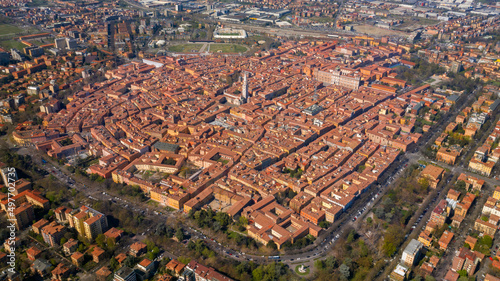 Aerial view on the historic center of Modena surrounded by tree-lined avenues. In the center stands the Ghirlandina tower.