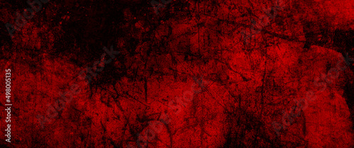 Red grunge texture background of cement plaster wall with cracks, red grunge wall texture. dark red grunge background. Horror Cement texture, wall full of scratches, Scary dark wall, grungy cement.