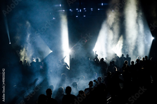 people dancing in the techno club festival