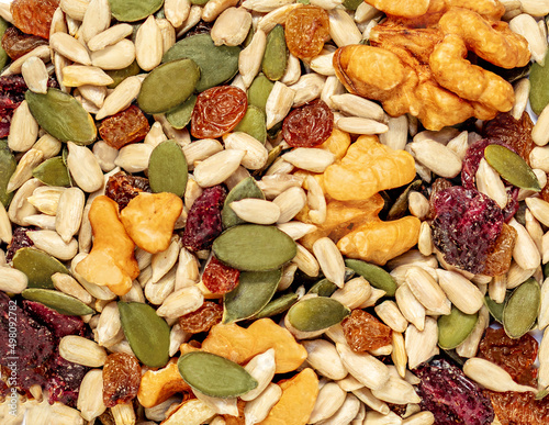 Nuts and seeds as a background. Pattern of granola or muesli Top view