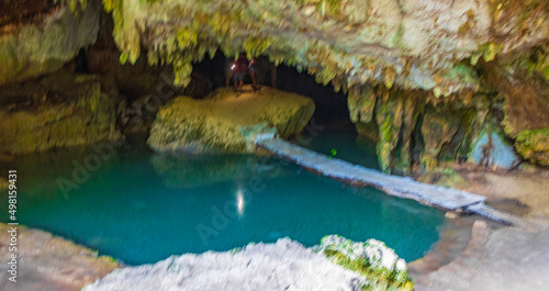 Amazing blue turquoise water and limestone cave sinkhole cenote Mexico.