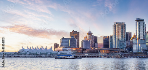 Panoramic View of Modern City Building Skyline on West Coast Pacific Ocean. Dramatic Sunrise Sky Art Render. Stanley Park, Coal Harbour, Downtown Vancouver, British Columbia, Canada.