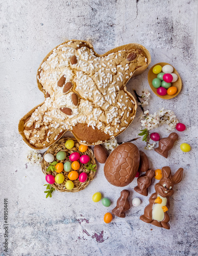 Traditional Italian Easter Dove Bread Colomba , Chocolate Easter Eggs and Cherry Blossoms 