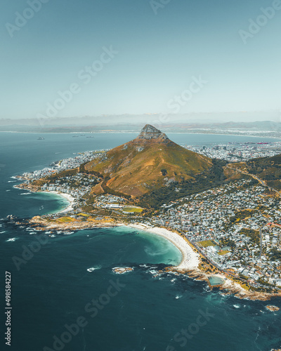 Aerial shot of the coast of Cape Town, South Africa and Signal Hill