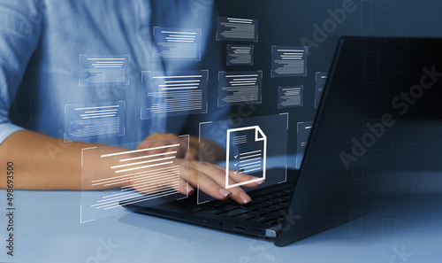 Business person working at laptop computer and digital documents with checkbox lists. Law regulation and compliance rules on virtual screen concept. 