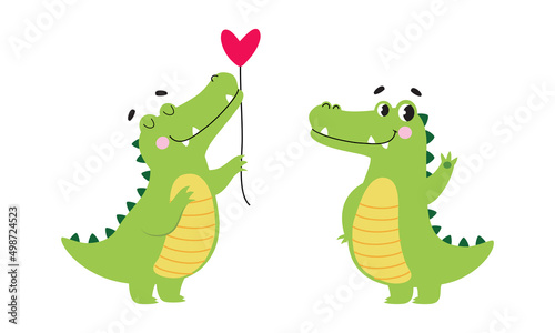 Cute friendly green crocodiles set. Lovely baby alligators cartoon vector illustration