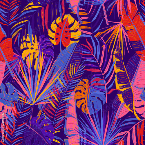 Tropic seamless pattern vector background with tropical leaves in bright color on dark backdrop. Cool floral exotic plant in simple modern flat style