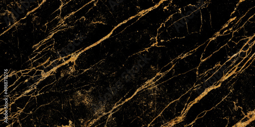 black Portoro marble with golden veins. Black golden natural texture of marbl. abstract black, white, gold and yellow marbel. hi gloss texture of marble stone for digital wall tiles design. 