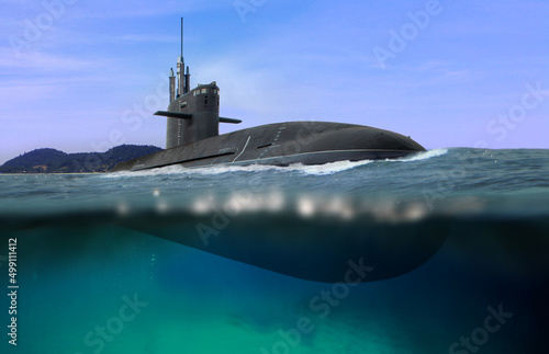 Naval submarine floating and half submerged in shallow water