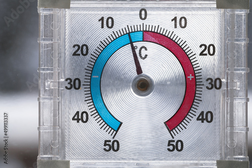 Outdoor window thermometer shows negative temperature in degrees Celsius