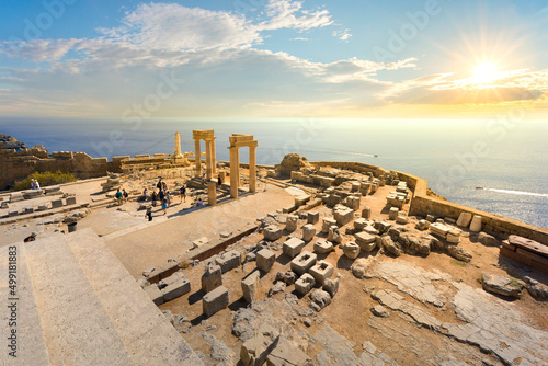 Sunset view of the sea from the ancient Greek ruins of the Lindos Acropolis on the island of Rhodes, Greece.