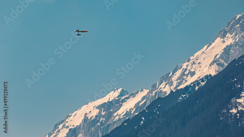 Beautiful alpine winter view with a hang-glider near Telfs, Tyrol, Austria
