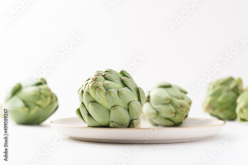 Fresh artichoke on white background