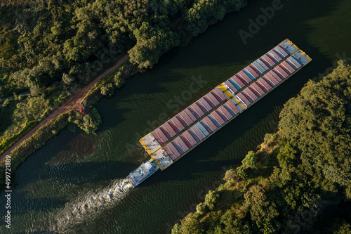 grain transport barge going up the tiete river - tiete-parana waterway