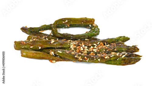 Food for gourmets. Baked asparagus with pine nuts