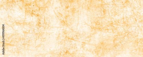 Old brown paper texture, vintage paper background, Plaster on a yellow wall. Concrete wall texture close up, Old distressed illustration. Abstract damaged illustration.