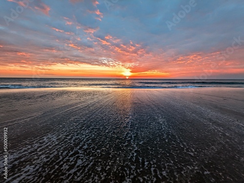 Beautiful sunrise sunset orange red background in the outer Banks of North Carolina