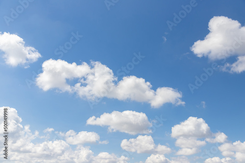 white cloud and blue sky background. hot day in summer.