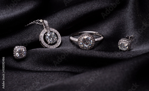 amazing silver set with diamonds on a black background