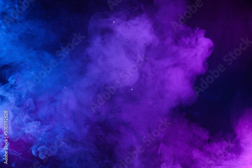 Smoke clouds pink and blue with shiny glitter stars abstract cosmic sky background