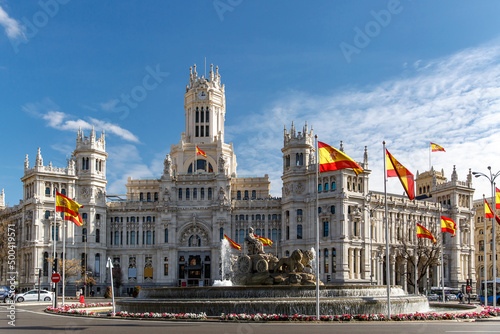 A lot of Spanish flags in Plaza Cibeles in Madrid, Spain.