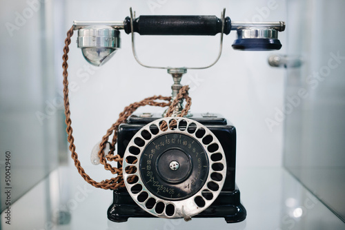 old retro black dial telephone with numbers