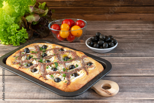 Pissaladière is the famous French onion pie. This onion "pizza" with anchovies and olives comes from Nice and can be made with bread or cooked dough.