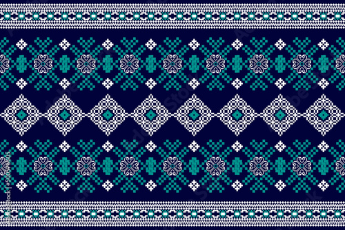 Beautiful Native cross stitch pattern on blue background.Aztec style embroidery abstract vector illustration.white oriental with green leaf.design for texture,fabric,clothing,wrapping,carpet,print.