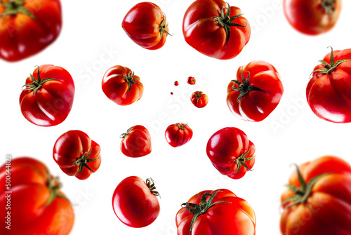 Collection of pachino tomato falling isolated on white background. Selective focus