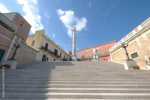 Virgiliana staircase on which the two Roman columns that indicate the end of the Appian, Brindisi, Apulia, Italy