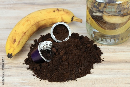 Coffee grounds from espresso coffee capsules and banana peels for plants better growing. Eco friendly and cheap way how to manure plants and flowers.