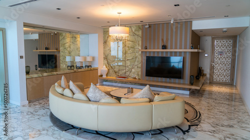 Abu Dhabi, UAE - February 2022: Interior of a suite room in Conrad Abu Dhabi Etihad Towers hotel.