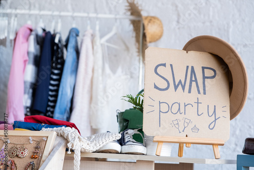 Swap Party invitation poster with stylized lettering and style decoration. Event for exchange of clothes, shoes and accessories. Reduce and reuse concept. Idea of exchange your old wardrobe for new