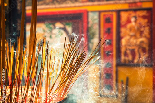 Burning incense sticks in Saigon Vietnam.