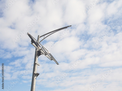 Construction of a solar-powered street lamp. Green energy