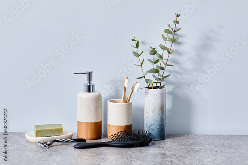 mage of personal toiletries for hygiene and beauty on ceramic table in bathroom