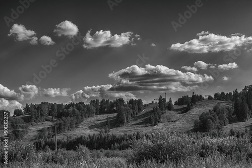 Dramatic summer black and white scenic with ski slopes