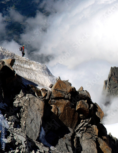 Single alpinist in high French Alps, close to Aiguille du Midi, Mont Blanc massif, Chamonix, Haute-Savoie, Rhône-Alpes, France, Europe