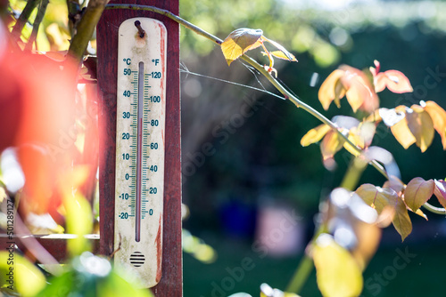 Garden thermometer showing high temperature even in the shade. Heatwave