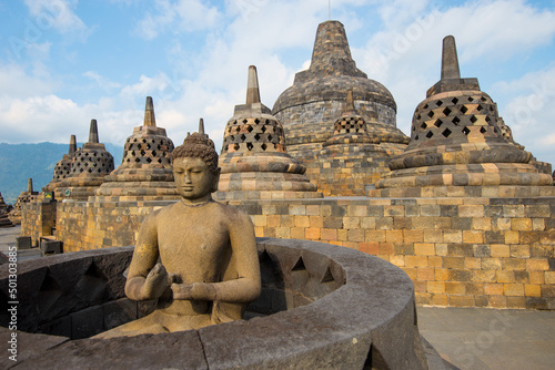 Buddha statue at buddhist temple Borobudur, Java, Indonesia