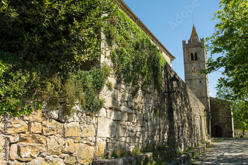 The town walls and belltower of the Parish Church of the Assumption of Mary in the medieval village of Hum in Istria, Croatia. The 11th-12th century main entrance gate, Glavna Gradska Vrata, is on the