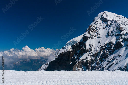 View of snow on the beautiful mountain with blue sky on summer in Jungfrau, Switzerland