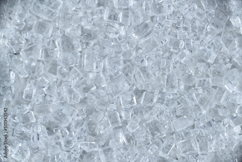 crystals cubes of white refined sugar macro under the microscope