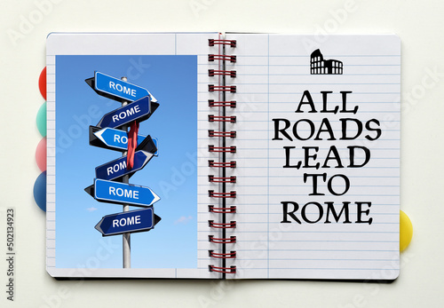 All roads lead to Rome quote. Street sign with Rome city name inside a notebook.