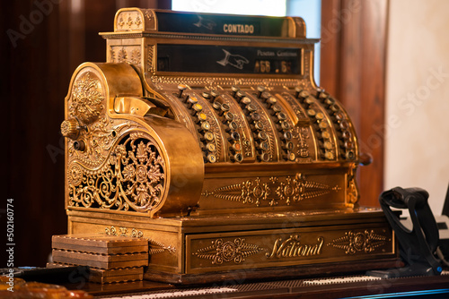 Vintage mechanical cash register system "National" made of copper.