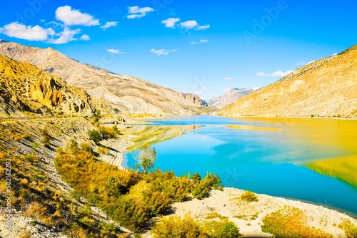 Panoramic view blue water of Chorokhi in Turkey Artvin region with scenic mountains background in clear sunny autumn day